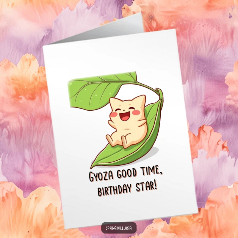 Funny Free Printable Birthday Card: A laughing gyoza joyfully slides down a large green leaf, bringing birthday cheer.